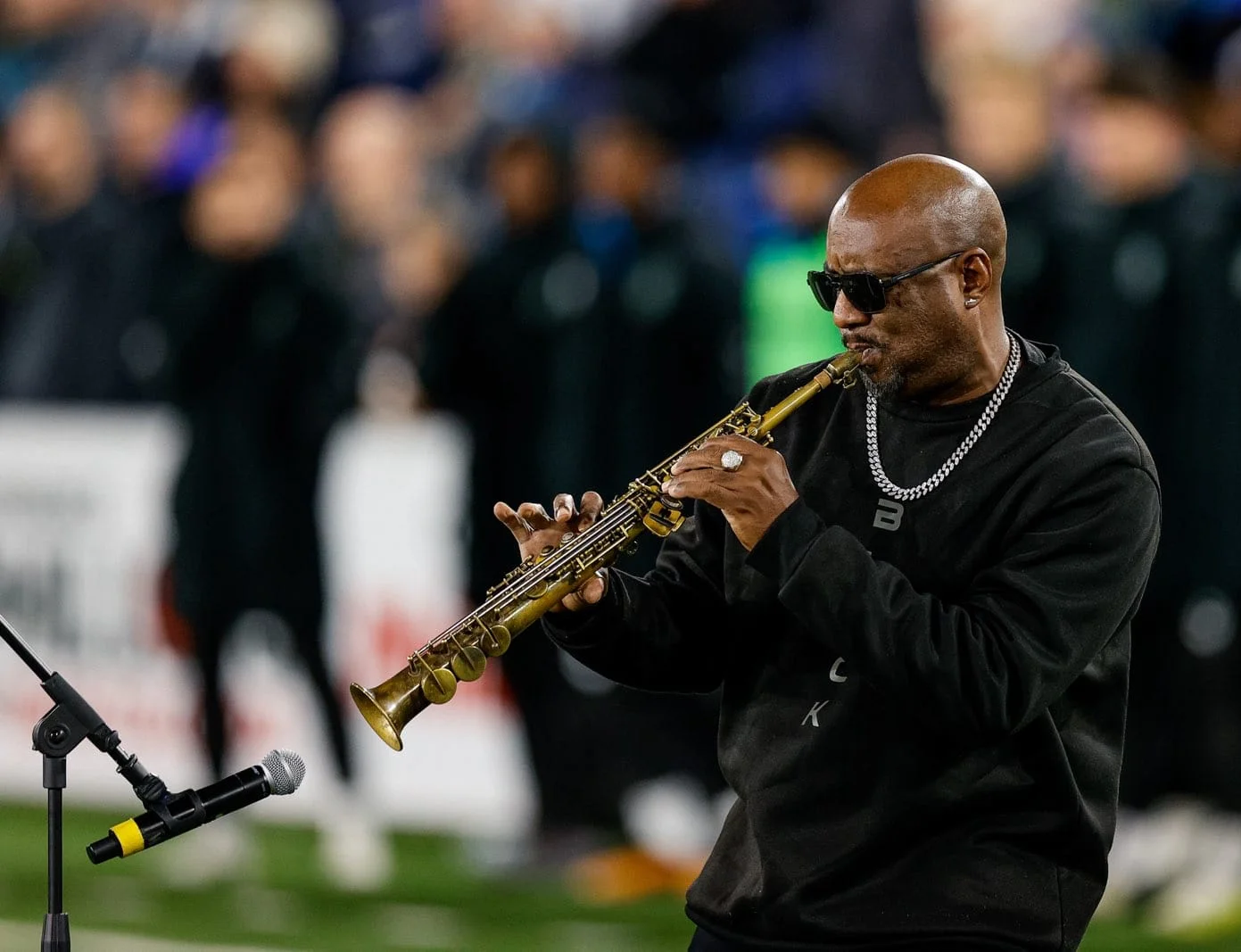 Tony Exum Jr. performing saxophone in Denver